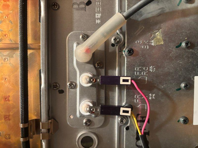 Responded to callback for heating unit displaying error code 11 related to ignition failure, following previous repair completed on 4/29. Upon arrival, accessed the second-floor unit and removed cover panel to inspect internal components and electrical connections. Examined ignition system, control board, wiring harnesses, and gas valve assembly. Verified proper electrical connections at terminal blocks, checked wire integrity including pink and yellow leads at bus bars, and inspected control module functionality. Documented internal condition of heat exchanger, burner assembly, and all safety controls with photographs. Tested system operation and confirmed unit firing properly with no error codes present.