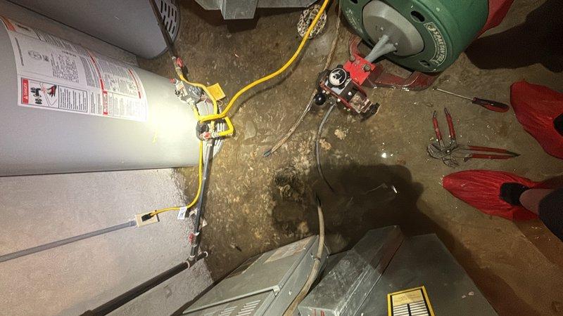 Responded to a clogged toilet and sink issue in the basement utility area. Upon arrival, assessed the drainage system and successfully cleared the blockage using professional drain cleaning equipment. The fixtures were tested and confirmed to be draining properly, with all plumbing connections and water heater area inspected to ensure no additional issues were present.