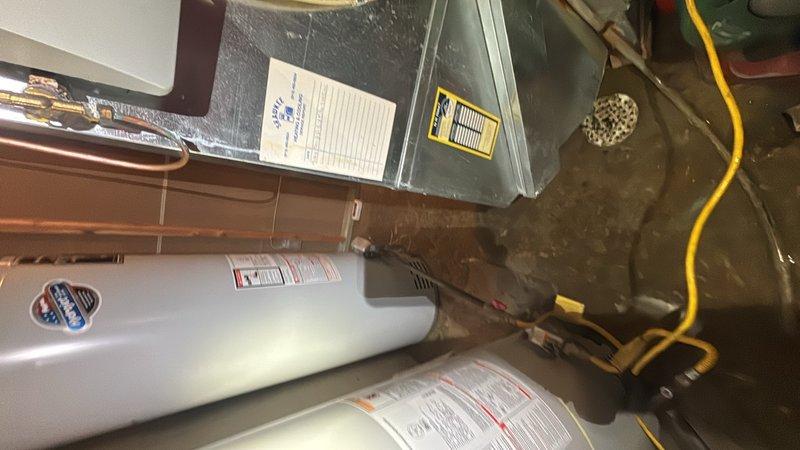 Responded to a clogged toilet and sink issue in the basement utility area. Upon arrival, assessed the drainage system and successfully cleared the blockage using professional drain cleaning equipment. The fixtures were tested and confirmed to be draining properly, with all plumbing connections and water heater area inspected to ensure no additional issues were present.