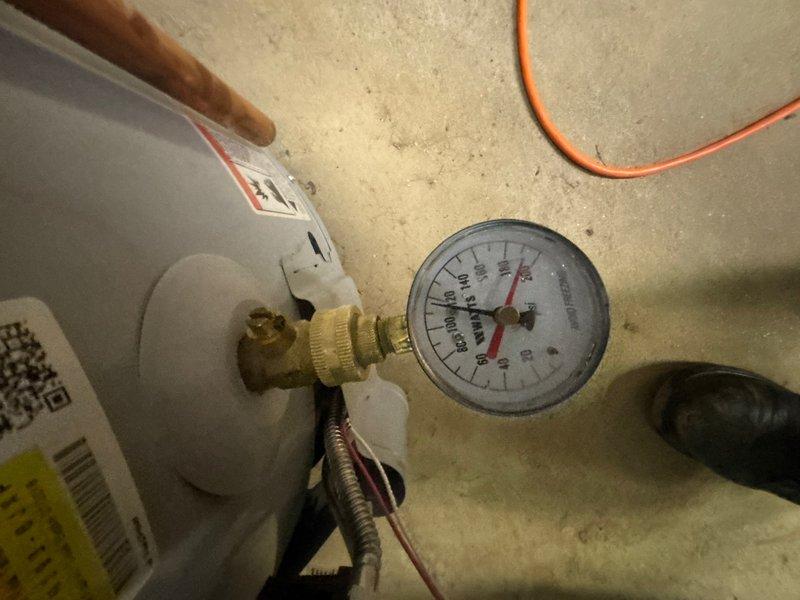 Performed annual plumbing maintenance including water heater flush as previously requested by customer. Tested water heater pressure and verified proper operating parameters using calibrated pressure gauge, confirming system functionality and safety compliance.