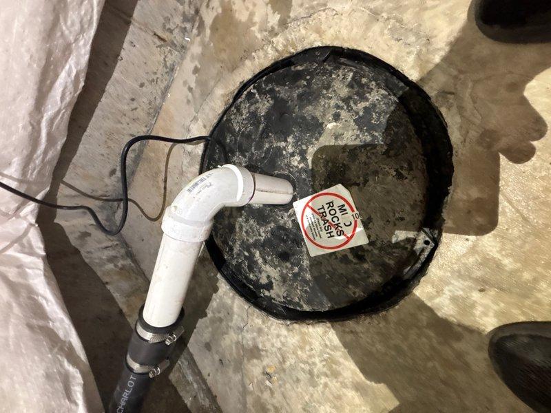 Replaced existing sump pump with a new 1/3 HP unit to restore proper basement drainage and water removal capability. Sealed the pit cover with silicone to eliminate odors and prevent humidity from entering the basement living space, improving indoor air quality and comfort.