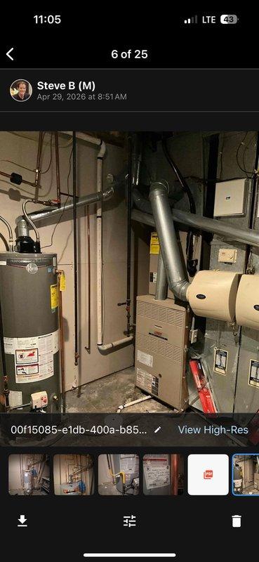 Installed a 50-gallon gas water heater with thermal expansion tank in collaboration with HVAC team. The unit was properly secured to the wall with safety strapping, and all copper piping connections were completed at the top of the heater for hot and cold water supply lines. Installation included protective insulation on water connections and proper clearances for maintenance access.