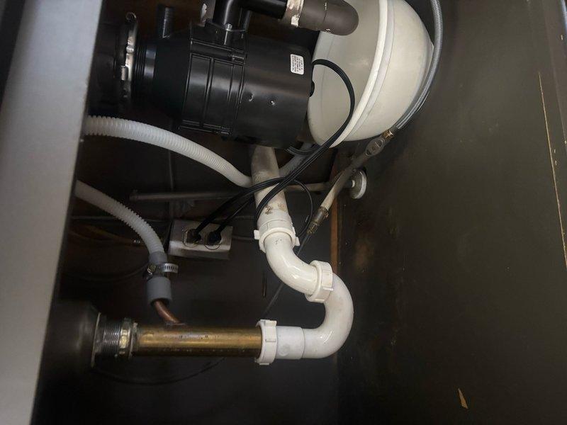 Replaced faulty shut-off valve underneath kitchen sink as reported. Verified proper operation of replacement valve and inspected surrounding plumbing connections, including garbage disposal drain lines and P-trap assembly, to ensure no leaks or additional issues were present.