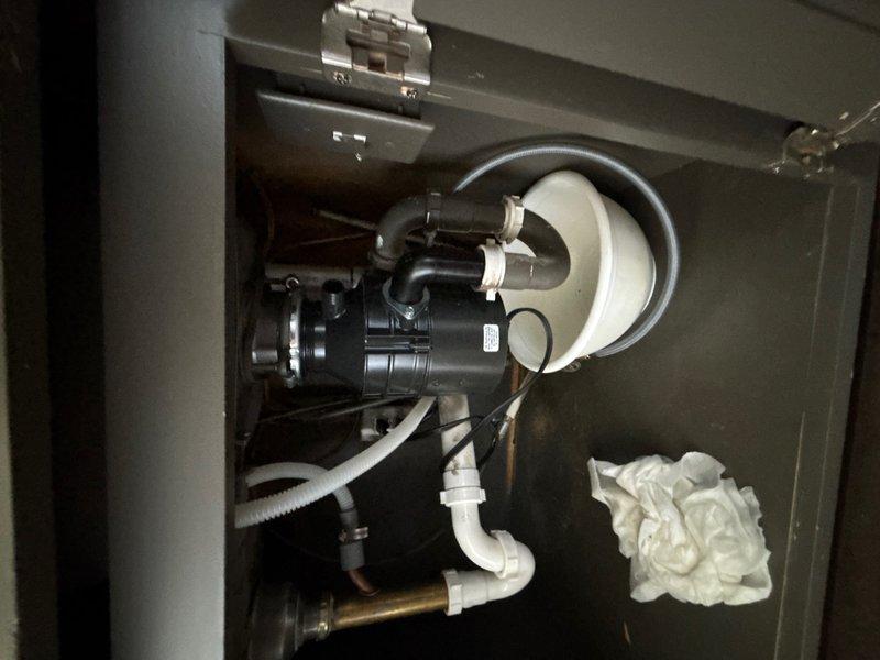 Replaced faulty shut-off valve underneath kitchen sink as reported. Verified proper operation of replacement valve and inspected surrounding plumbing connections, including garbage disposal drain lines and P-trap assembly, to ensure no leaks or additional issues were present.