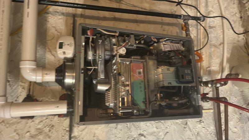 Performed scheduled maintenance on tankless water heater system, completing a comprehensive flush procedure to remove mineral buildup and sediment from the heat exchanger. Unit was isolated using service valves, flushed with descaling solution through circulation pump setup, then rinsed thoroughly to restore optimal heating efficiency and extend equipment lifespan.