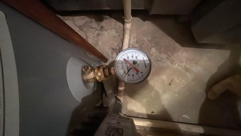 Completed preventive plumbing maintenance inspection on residential water heater system. Verified proper operation of pressure relief valve and gauge, confirming pressure readings within normal parameters. Inspected hot and cold water shut-off valves and flexible supply lines for leaks, corrosion, and proper connection integrity. All components found to be functioning correctly with no immediate repairs required.