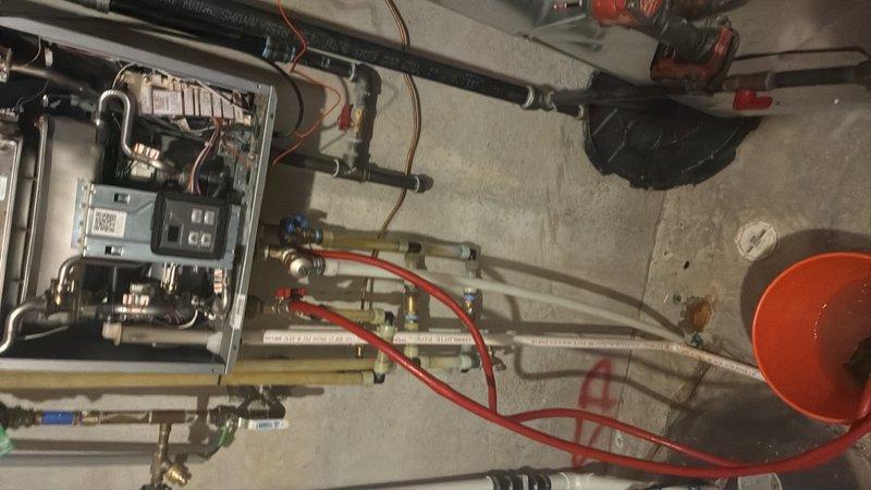 Performed scheduled maintenance on tankless water heater system, including complete flush procedure to remove mineral buildup and sediment. Removed and cleaned inlet filter screens, which showed accumulation of debris, then reinstalled filters and verified proper system operation. All components inspected and system restored to optimal working condition.