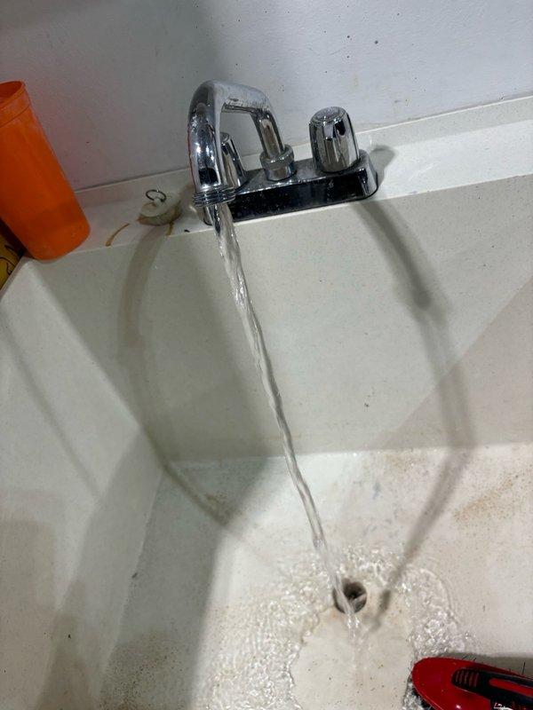 Performed routine plumbing maintenance visit including water pressure testing and fixture operation verification. Tested water heater system pressure using calibrated gauge, confirming readings within normal operating parameters, and verified proper function of sink faucet with adequate water flow and no leaks detected at fixtures or connections.