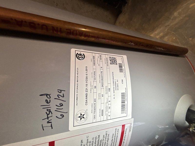 Completed comprehensive whole-home plumbing inspection at customer's request with no reported issues or concerns. Performed thorough visual assessment of all accessible plumbing fixtures, supply lines, drain systems, and water heating equipment throughout the residence. Inspected bathroom facilities including shower base with center drain configuration, verified proper drainage function and fixture condition. Examined water heater installation, confirmed equipment specifications and compliance labeling, and noted recent installation date of June 2024 on unit documentation. All visible copper supply piping, drainage systems, and plumbing fixtures found to be functioning properly with no leaks, corrosion concerns, or immediate service needs identified at time of inspection.