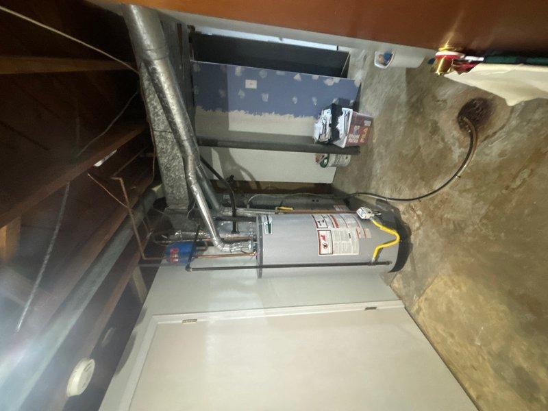 Responded to service call for residential tanked water heater with pilot light failure. Upon inspection, diagnosed and addressed issue with gas control valve assembly preventing pilot ignition. Verified proper gas flow through flexible corrugated gas line connection, cleaned pilot assembly, and successfully relit pilot flame. Tested thermocouple operation and confirmed stable pilot flame retention. Verified all safety controls functioning properly and water heater returning to normal operation with adequate hot water production.
