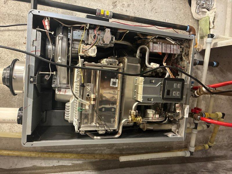 Performed maintenance on tankless water heater and standard water heater system, completing full flush procedures on both units to remove mineral buildup and ensure optimal performance. Cleared slow-draining shower in bathroom using mechanical snake to restore proper drainage. Customer also requested estimate for water softener service, which will be provided separately.