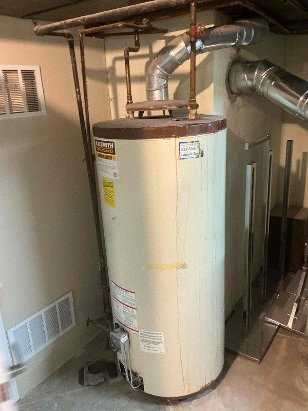 Responded to no hot water complaint in basement and completed installation of 75-gallon gas water heater. Obtained and applied plumbing permit 26PLU-09910 with required plumbing identification sticker. Connected copper supply lines, installed proper venting system, and verified all connections for proper operation and code compliance.