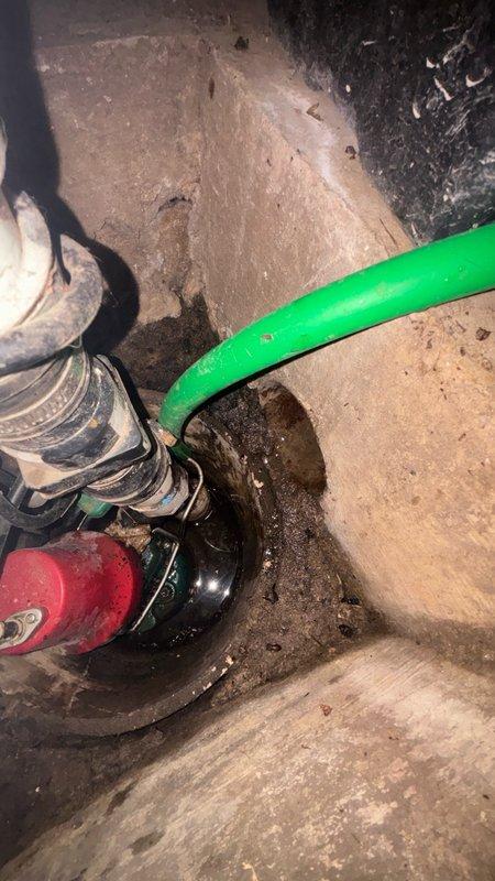 Responded to clogged backyard drain following heavy rainfall. Upon inspection, located drainage system with multiple PVC and metal piping connections showing signs of water accumulation and debris blockage. Cleared obstruction from outdoor drain covers and verified proper water flow through the system. Inspected interior plumbing connections in utility area to ensure no backup or secondary blockages in the drainage line. System restored to normal operation with proper drainage confirmed.