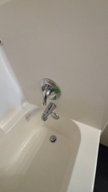 Responded to upstairs bathroom for reported steady drip from shower faucet. Upon inspection, identified faulty ceramic cartridge in single-handle tub/shower valve assembly. Removed existing cartridge and installed Pfister ceramic cartridge (model 974-042) to restore proper valve function and eliminate leak. Tested operation and confirmed drip has been resolved with no further leakage detected.