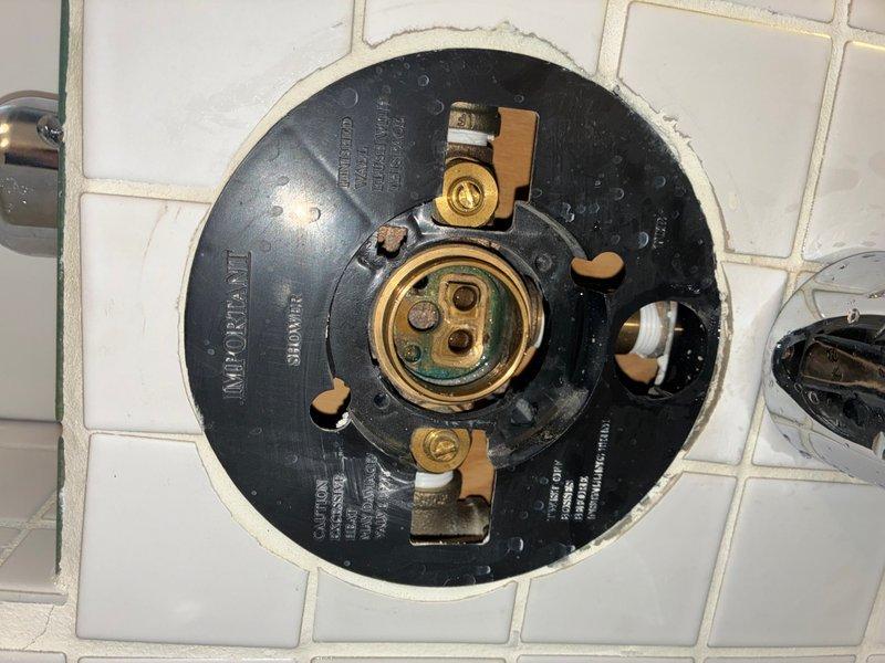 Responded to low water pressure complaint on third floor shower. Inspected Imperial brand shower valve assembly and thermostatic mixing valve to diagnose cause of reduced flow. Removed valve cover plates to examine internal brass components, cartridge mechanism, and water supply connections for blockages, debris, or mechanical failure. Documented condition of shower control system and thermostatic temperature regulator. Provided recommendations to customer for improving water pressure, which may include cartridge replacement, pressure balancing valve adjustment, or addressing supply line restrictions affecting third floor fixtures.