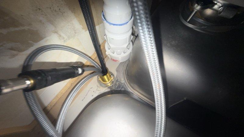 Installed new kitchen faucet on main floor, including complete drain assembly with PVC piping and brass fittings, connected braided stainless steel supply lines, and dishwasher drain hose. Additionally repaired two toilets in the 35-year-old residence. All plumbing connections tested and verified leak-free upon completion.
