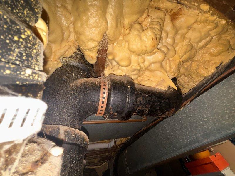 Conducted initial site assessment for comprehensive sewer line replacement project. Evaluated existing clay tile piping from residence to municipal connection point and assessed cast iron piping running approximately 10 feet from main stack to building exterior. Documented current conditions of basement living space and crawl space infrastructure, including exposed spray foam insulation, existing plumbing lines, and HVAC ductwork to prepare estimate for complete pipe replacement and camera scope inspection of sewer system.