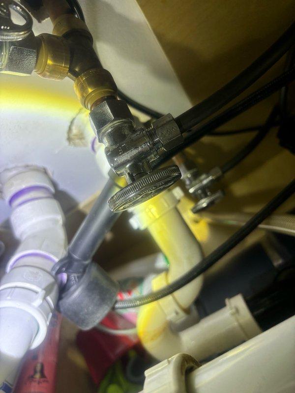 Completed plumbing maintenance inspection and service call addressing tankless flush system components and associated water supply connections. Inspected and verified proper operation of shut-off valves, flexible supply lines with braided metal construction, and PVC drainage piping throughout the installation, ensuring all connections were secure and functioning within normal parameters.