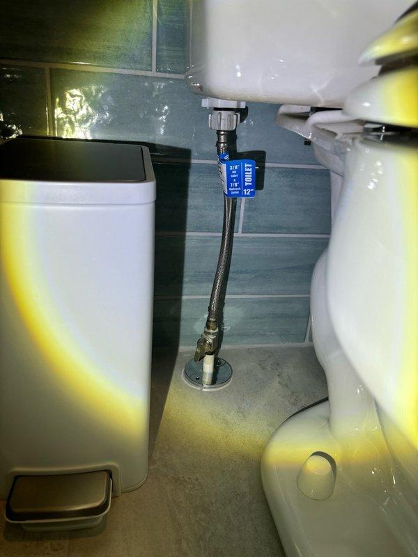 Completed plumbing maintenance inspection and service call addressing tankless flush system components and associated water supply connections. Inspected and verified proper operation of shut-off valves, flexible supply lines with braided metal construction, and PVC drainage piping throughout the installation, ensuring all connections were secure and functioning within normal parameters.