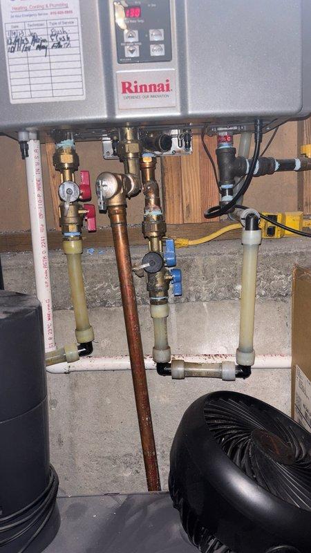 Responded to service call for Rinnai tankless water heater experiencing intermittent temperature maintenance issues and displaying error code 12 (low gas pressure/flow detection). Unit required weekly manual resets to restore operation. Upon inspection, diagnosed faulty flame rod sensor causing erratic gas valve operation and false low-gas readings. Removed and replaced defective flame rod assembly with OEM Rinnai component. Verified proper sensor positioning and electrical connectivity. Tested unit through multiple heating cycles to confirm consistent temperature output and proper gas valve modulation. System now operating within manufacturer specifications with no error codes present.