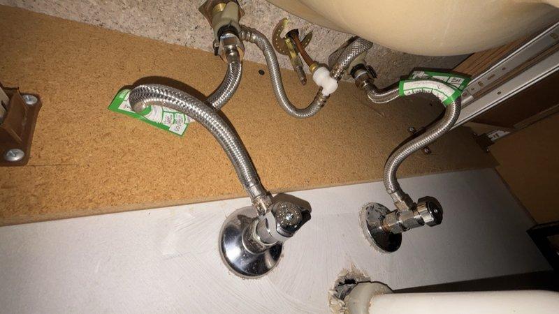 Responded to service call for faucet replacement and evaluation of outdoor valve system. Successfully replaced a warranty-covered faucet fixture, completing full installation with new braided stainless steel flex supply lines connected to existing chrome shutoff valves. Verified proper connections at sink basin, ensured secure mounting of all plumbing components, and tested system for leaks. Provided quote for replacement of two exterior hose bibs as requested. All connections sealed properly with no water leakage detected upon completion.