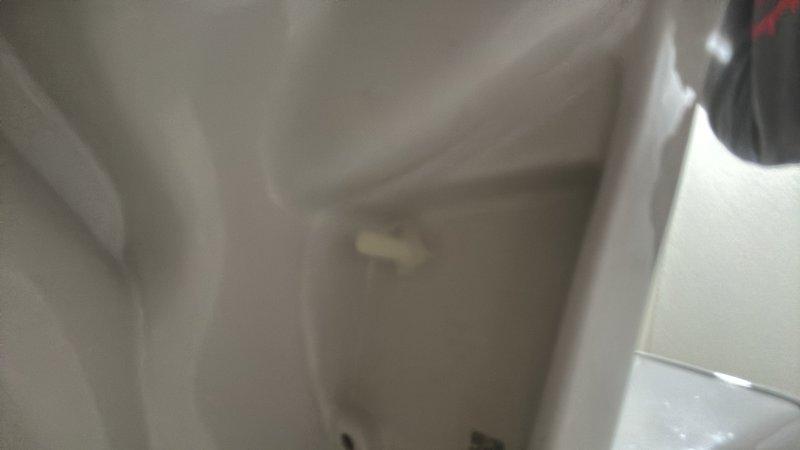 Completed toilet installation in residential bathroom. Installed new white toilet unit with proper mounting and sealing to tiled floor. Note: Toilet seat may require replacement or adjustment to ensure correct fit and model compatibility with installed fixture.