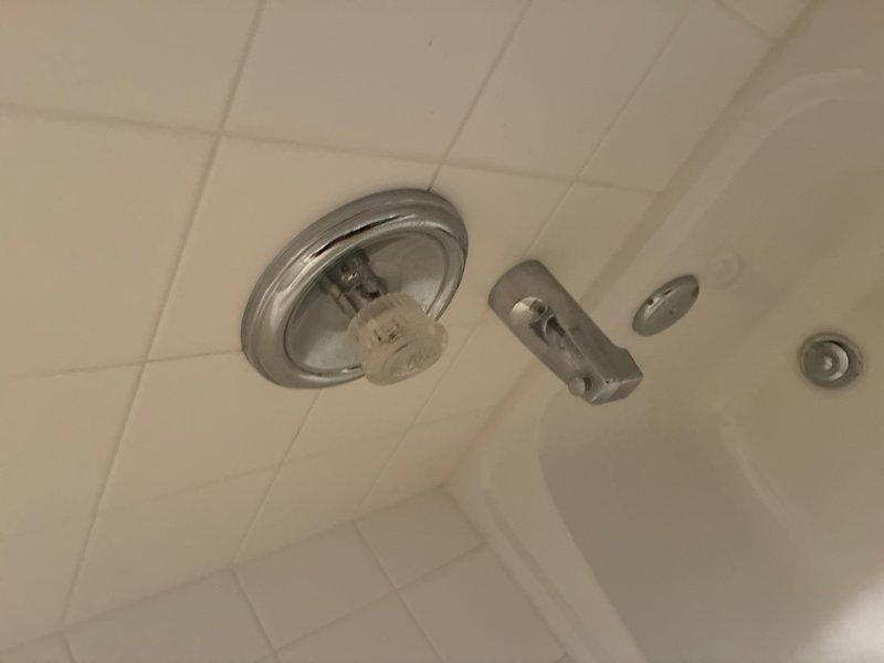 Responded to kitchen sink leak originating from garbage disposal unit on left side of double stainless steel sink. Replaced defective garbage disposal with new unit, ensuring proper mounting and secure connections to drain system. Installed new double-bowl stainless steel kitchen sink and coordinating kitchen faucet with appropriate supply line connections. In both bathrooms, removed existing fixtures and installed matching bathroom sink faucets with updated hardware. Replaced tub and shower faucets in both bathrooms, including new trim kits, valve assemblies, and shower arms. All installations tested for proper operation and inspected for leaks. Verified adequate water pressure and drainage throughout all fixtures. Cleanup completed and all old fixtures removed from premises.