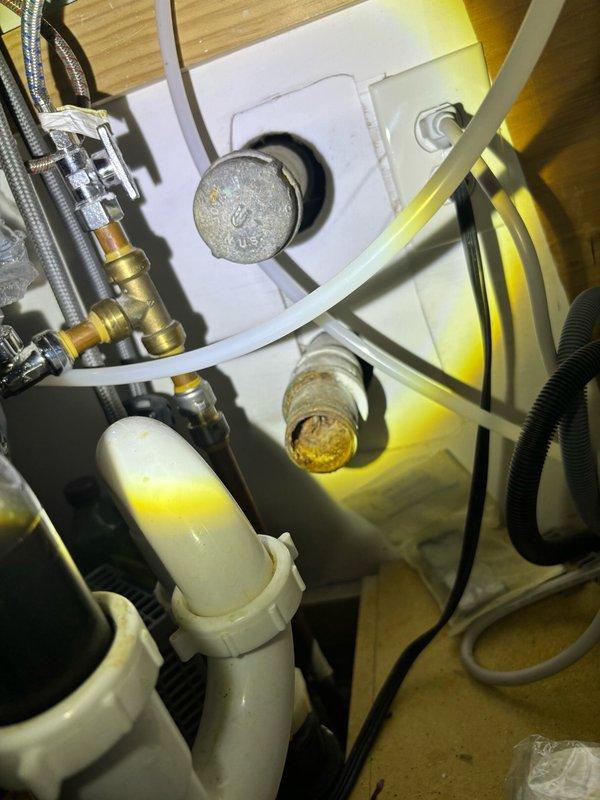 Completed comprehensive whole-home plumbing inspection including visual and operational assessment of all accessible fixtures and systems. Inspected bathroom shower system with ceiling-mounted showerhead assembly, verified proper water flow and drainage operation, examined tile surround and glass enclosure for signs of leaks or moisture damage. Conducted thorough examination of under-sink plumbing including supply line connections, shut-off valves, drain assemblies, and flexible supply hoses; noted minor mineral deposits and age-related discoloration on brass fittings but all components functioning within normal parameters. Performed visual and operational check of sump pump system as requested. All plumbing systems inspected found to be operational with no immediate repairs required at time of service.