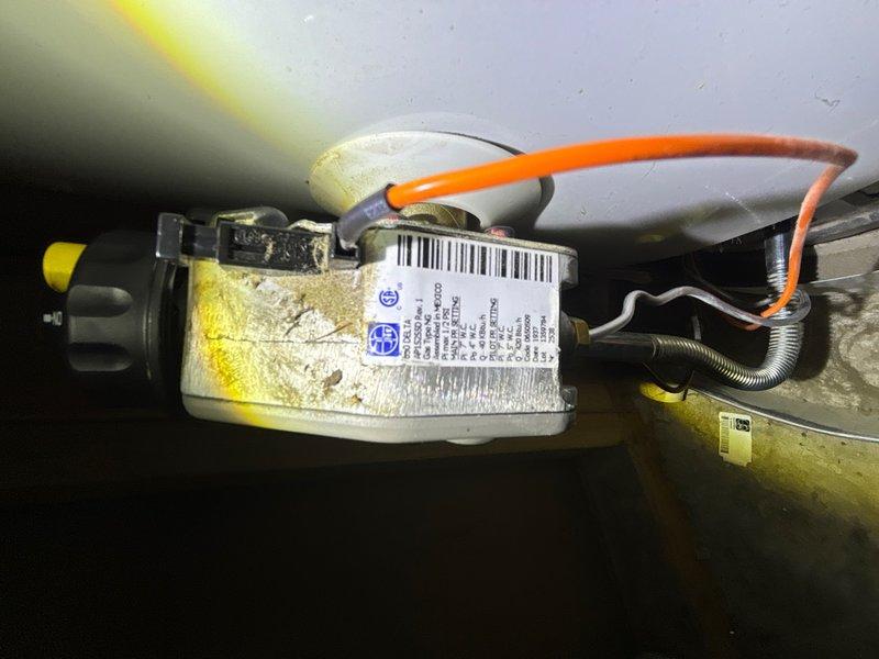 Responded to service call for gas water heater with pilot light that would not remain lit in 30-year-old residential property. Upon arrival, performed diagnostic inspection of tanked water heater unit located in basement. Confirmed pilot light ignition issue preventing burner operation and hot water production.

Disassembled burner assembly and inspected thermocouple condition, flame sensor positioning, and gas control valve functionality. Identified faulty thermocouple as primary cause of pilot light failure. Cleaned burner orifice and pilot assembly of accumulated dust and debris that had restricted proper flame detection. Tested thermocouple output voltage and confirmed readings below manufacturer specifications, indicating component failure.

Replaced defective thermocouple with new OEM-equivalent part and repositioned flame sensor to ensure proper contact with pilot flame. Verified gas supply pressure and adjusted pilot flame height to manufacturer specifications. Relit pilot ligh