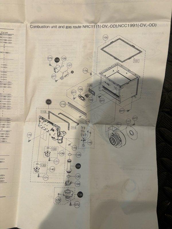 Responded to no hot water complaint in basement. Diagnosed tankless water heater unit (NRC1111/NCC1991 series) experiencing operational failure preventing hot water delivery throughout home. Performed comprehensive system inspection including combustion unit and gas route components. Referenced technical schematic to identify faulty parts within the combustion assembly. Completed diagnostic evaluation of all mechanical connections, gas supply lines, and plumbing infrastructure. Documented equipment condition and component specifications for repair recommendations.