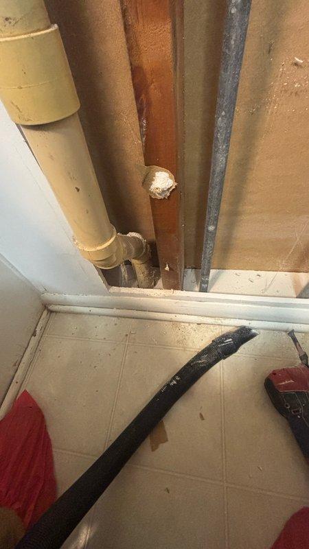 Replaced washer box assembly in utility area, requiring access through ceiling/wall cavity. Cut and removed sheetrock as needed to reach existing plumbing connections. Installed new washer box with supply valves and drain connection, securing all mounting points to structural framing. Verified proper operation of shut-off valves and tested for leaks. Customer advised that sheetrock repair and finishing is not included in plumbing scope of work.