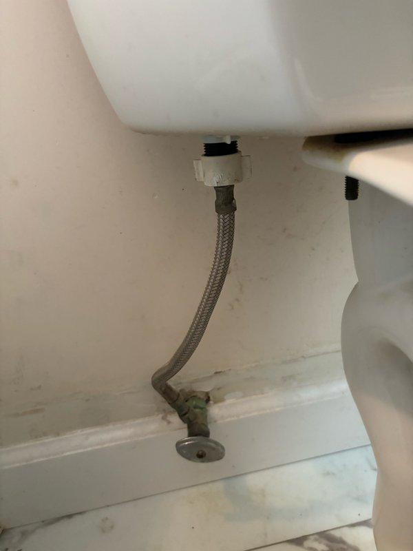 Responded to report of continuously running toilet on second floor. Upon inspection, diagnosed faulty fill valve causing constant water flow into tank. Replaced defective fill valve assembly with new unit, adjusted water level settings, and tested flush mechanism for proper operation. Verified braided stainless steel supply line connection at tank base for leaks and confirmed secure mounting. System now cycles correctly with no continuous running, restoring normal toilet function and eliminating water waste.