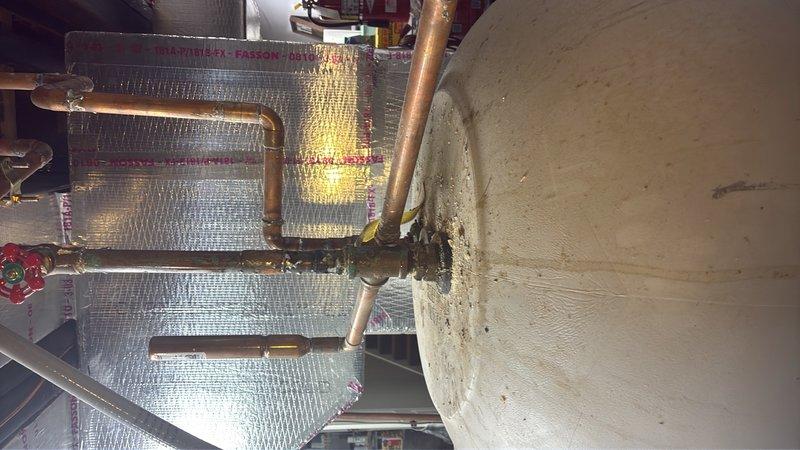 Responded to service call for water leak above water heater in basement and broken toilet floor bolt on main level. Upon inspection, identified slow drip at copper piping connections near HVAC heat exchanger coil assembly in basement mechanical room. Tightened compression fittings and verified leak repair at affected joints. Proceeded to main level bathroom where toilet mounting bolt was found fractured at floor flange connection. Removed toilet fixture to access closet flange, replaced damaged closet bolt with new brass hardware, reset toilet with new wax ring seal, and torqued mounting nuts to proper specification. Verified secure installation and tested flush mechanism for proper operation. Both issues successfully resolved with no additional leaks detected upon final inspection.