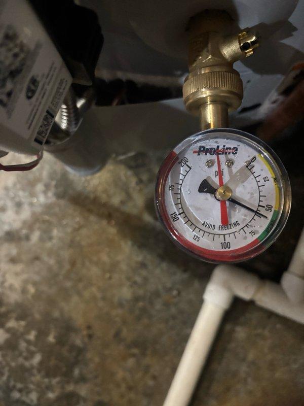 Completed installation of a 50-gallon gas water heater with thermal expansion tank and ball valve shut-off in utility area. Installed pressure reducing valve (PRV) in conjunction with water heater replacement to regulate incoming water pressure and protect the new system. All copper piping connections were properly fitted with brass fittings, pressure relief valve was installed and tested, and expansion tank was mounted to accommodate thermal expansion in the closed plumbing system. System was pressurized, tested for leaks, and verified operational with gauge readings within acceptable parameters.