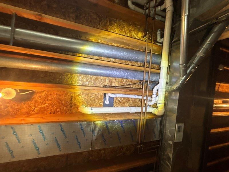 Completed preventive plumbing maintenance inspection and successfully installed two new faucets on the main level. Accessed crawl space and attic areas to verify proper copper supply line connections, shut-off valve functionality, and confirm no leaks present at installation points.