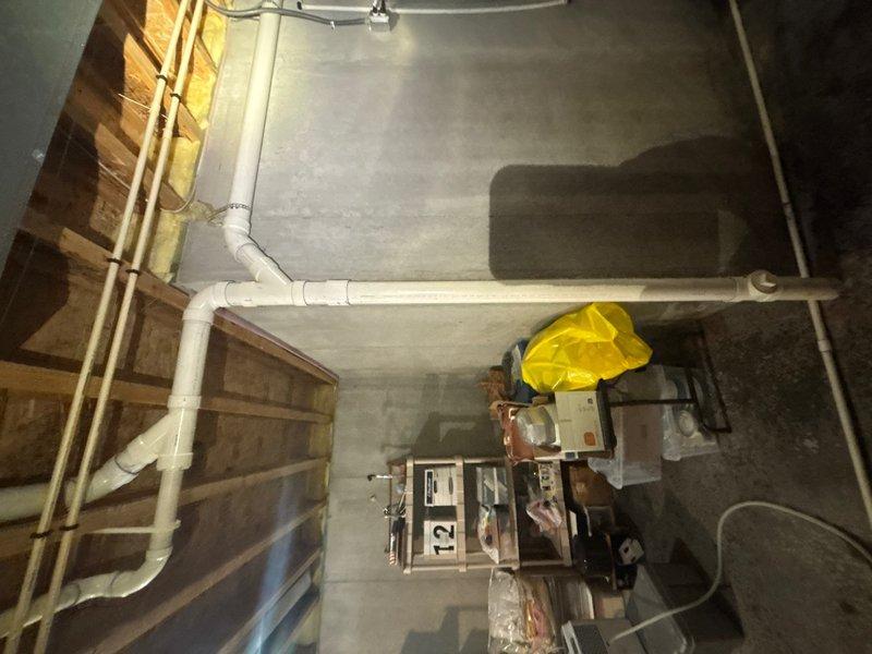Completed annual plumbing maintenance inspection covering residential bathroom fixtures and basement mechanical systems. Inspected bathroom vanity faucet, drain assembly, and supply lines for proper operation and leaks; verified basement drainage piping, PVC connections, and utility room plumbing infrastructure for structural integrity and code compliance.