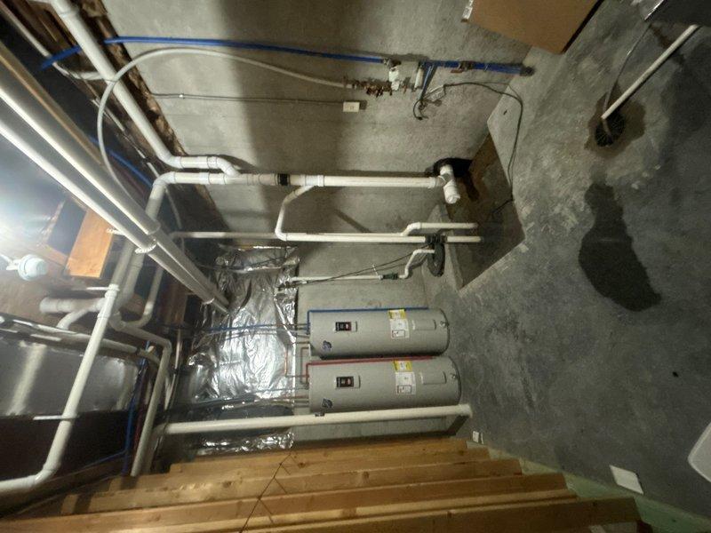 Responded to service call for non-operational sump pump caused by tripped breaker, resulting in 4 inches of standing water in basement area. Reset breaker and restored power to sump pump system, verified proper operation and water discharge. Inspected and assessed exterior water spigot that sustained freeze damage during recent cold weather event, confirmed burst fitting requiring replacement. Documented mechanical room conditions including water heaters, HVAC equipment, and plumbing infrastructure for service records.