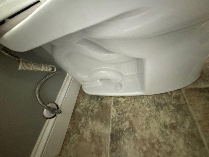 Installed new Toto Drake toilet in bathroom, including new wax ring seal and supply stop valve. Completed all necessary plumbing connections with braided stainless steel supply line, ensuring proper water flow and leak-free operation.