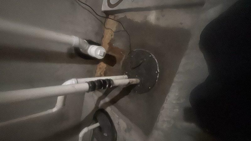 Replaced a failed 0.5 horsepower grinder pump with new unit, including proper electrical connections and discharge piping. Repaired exterior hose bib, installing a Prier or Woodford-style frost-free sillcock to prevent future freeze damage. Verified all connections for proper operation and tested system functionality upon completion.