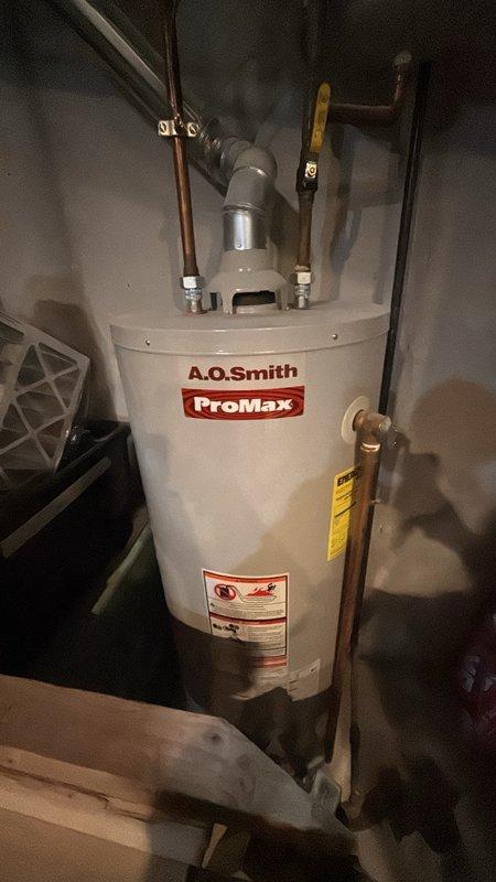 Completed estimate for replacement of existing water heater with new 50-gallon A.O. Smith ProMax unit in basement location. Evaluated current installation including copper supply line connections, temperature and pressure relief valve configuration, and expansion tank setup. Assessed accessibility, venting requirements, and compliance with current plumbing codes for proposed water heater replacement.