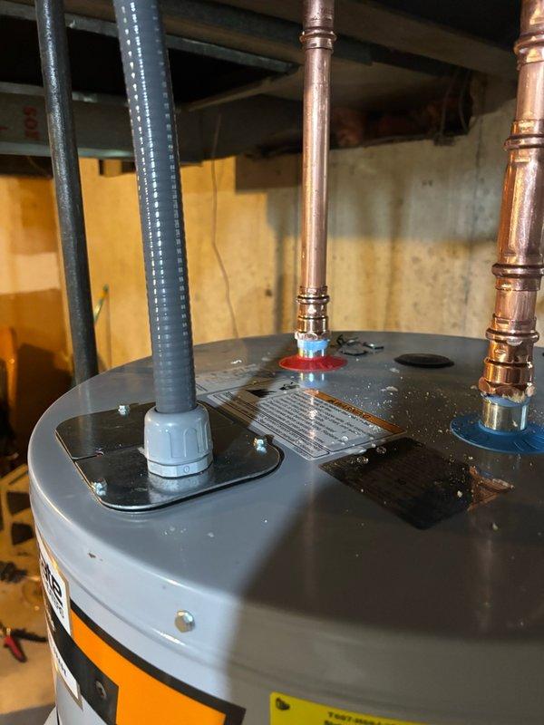 Installed a new 50-gallon State brand electric water heater in basement utility area. Connected copper supply lines to existing plumbing system with proper soldered joints, installed pressure relief valve with discharge piping, and completed all electrical connections per manufacturer specifications and local code requirements.