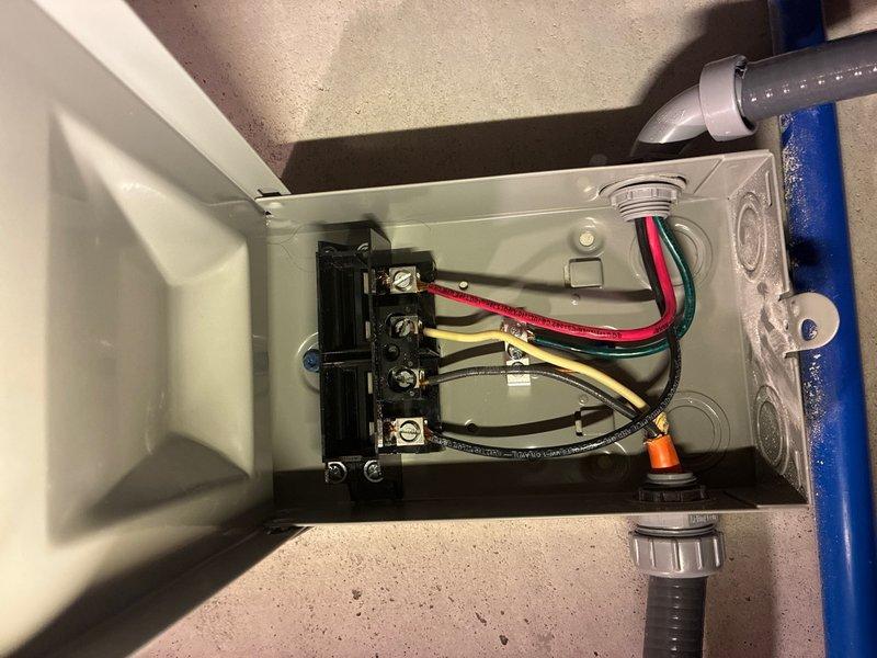 Completed installation of new tanked water heater system in residential utility space. Installed main water heater unit with proper electrical connections via junction box, including appropriate wire terminations and conduit fittings. Configured integrated plumbing manifold system using PEX piping with shutoff valves, connected expansion tanks, and installed pressure relief valve per code requirements. Verified all electrical connections, tested system operation, and confirmed proper temperature display functionality upon startup.