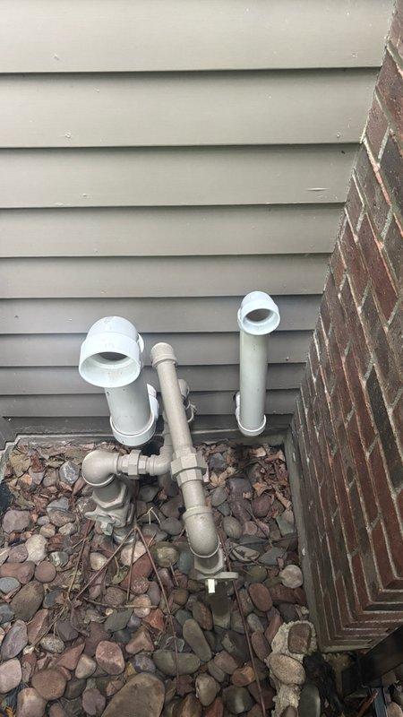 Responded to a Bradford tankless water heater displaying a C2 error code in the basement of a 1996-built home. Diagnosed the issue as hard water scale buildup affecting the heat exchanger and flow sensors. Performed a complete descaling service by isolating the unit, connecting a submersible pump with descaling solution, and circulating the solution through the heat exchanger and water lines for approximately 45 minutes to dissolve mineral deposits. Flushed the system thoroughly with clean water, cleared the error code, and verified proper operation with restored hot water flow and temperature control. Additionally, installed a quarter-turn ball valve shutoff on a copper water supply line in the basement ceiling as requested to provide isolation capability for future maintenance. Tested all connections for leaks and confirmed proper valve operation. Unit returned to normal function with no error codes present upon completion.