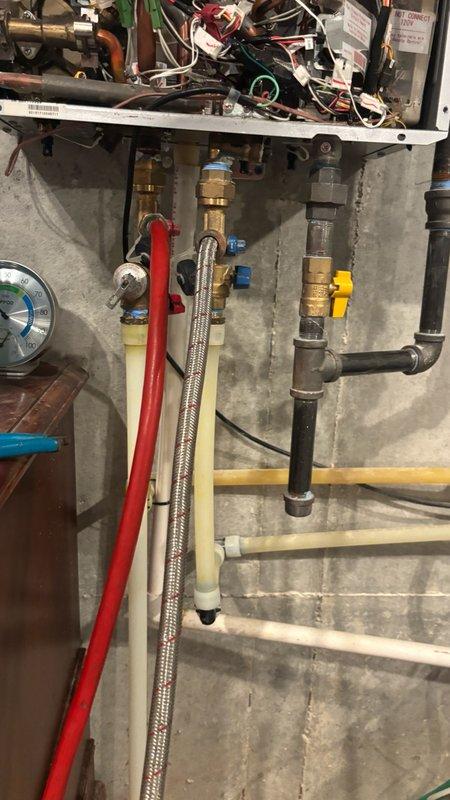 Completed preventative plumbing maintenance on Rinnai tankless water heater system, including full system flush and descaling procedure to remove mineral buildup and maintain optimal performance. Performed Puronic water softener treatment and verified all electrical connections, control panel functions, and safety components. System tested at 130°F operating temperature with all valves, pressure relief mechanisms, and shutoff points confirmed operational.