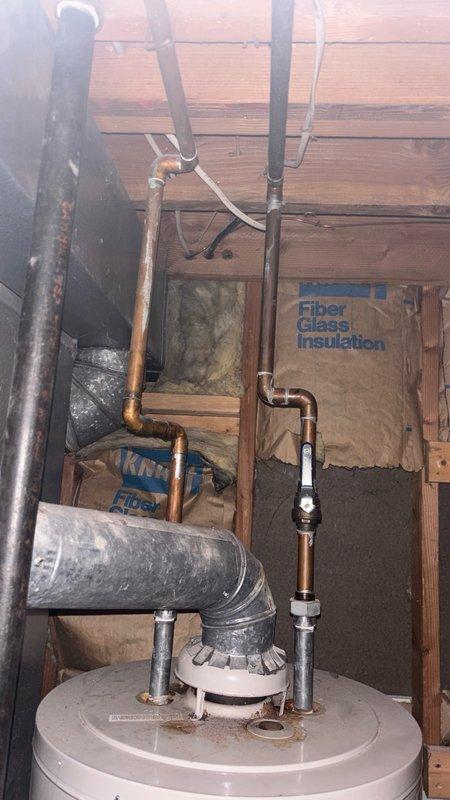 Performed routine maintenance flush on A.O. Smith ProMax tanked water heater located in basement mechanical area. Drained sediment buildup from tank, inspected inlet and outlet connections, verified proper operation of temperature and pressure relief valve, and checked all copper supply line connections for leaks or corrosion. Unit returned to normal operation with improved efficiency.