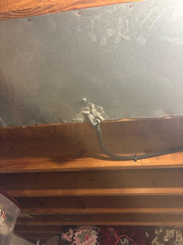 Completed diagnostic inspection and provided repair estimate for gas line relocation in attic/ceiling space. Assessed existing gas line routing through exposed framing alongside electrical conduits, PVC lines, and HVAC ductwork to determine optimal relocation path and feasibility for same-day completion.