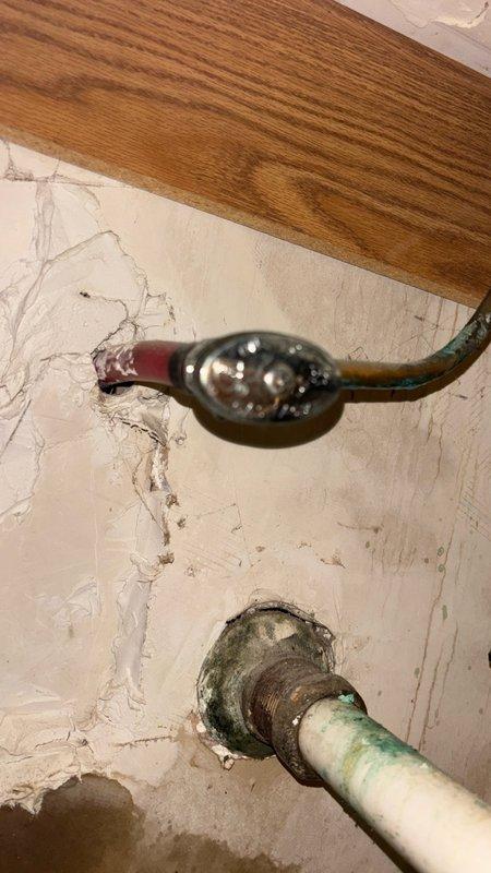 Responded to service call for bathroom faucet that would not shut off on main level. Upon inspection, identified severely corroded and deteriorated shut-off valve and supply line connections beneath sink. Replaced faulty valve assembly and corroded metal tailpiece showing extensive oxidation and mineral buildup. Installed new supply lines and P-trap components to ensure proper function and prevent future leaks. Tested faucet operation and verified complete shut-off capability restored with no active drips or leaks.