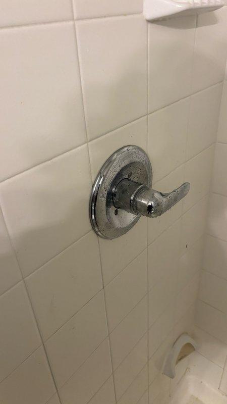 Responded to a call for a broken Delta shower cartridge in a guest bathroom. Upon arrival, found that the cartridge had broken off during a customer-attempted replacement, with the water supply already shut off. Successfully extracted the damaged cartridge remnants, installed a new Delta replacement cartridge, reassembled the trim components, restored water supply, and tested the shower valve for proper operation and leak-free performance.