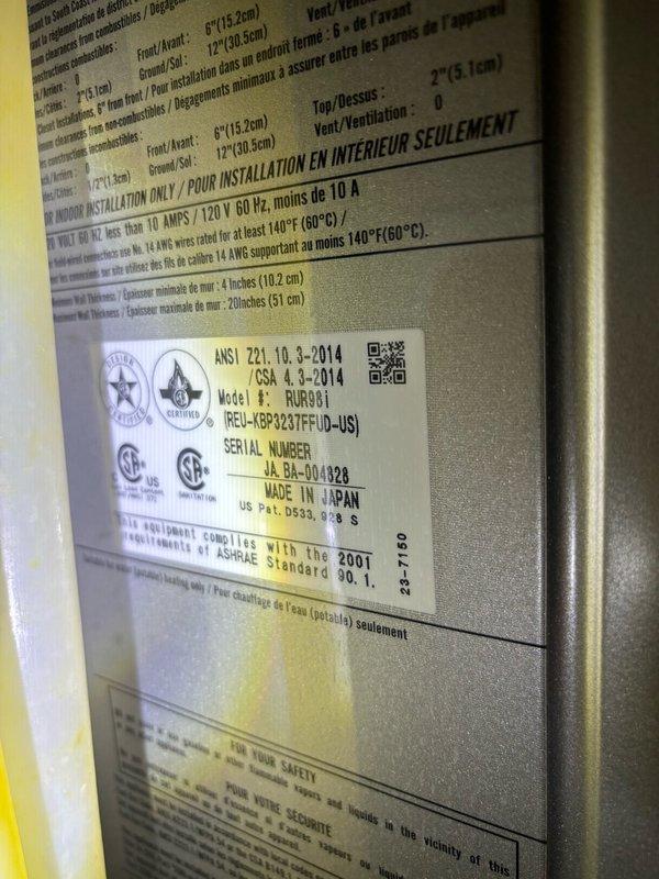 Completed preventive plumbing maintenance visit including tankless water heater flush service. Performed comprehensive system inspection of Rinnai RUR981 tankless water heater unit, model verified through manufacturer specifications label. Executed descaling flush procedure to remove mineral buildup and maintain optimal heat exchanger efficiency. Inspected gas valve connections, control module, and electrical connections for proper operation and safety compliance. Verified all wiring terminations, including NG (natural gas) connections at gas valve assembly. Checked blower motor housing and internal components for proper function. Confirmed unit compliance with ANSI Z21.10.3-2014 and CSA 4.3 standards. System operating within manufacturer specifications upon completion of maintenance service.