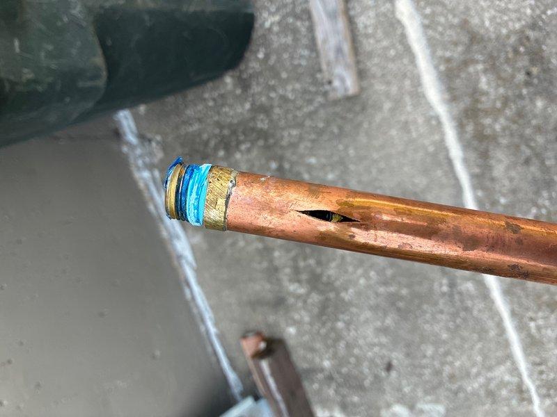 Completed repair of exterior faucet damaged by winter freeze conditions. Accessed copper supply line within insulated wall cavity, removed damaged section of pipe, and installed new brass fitting with proper thread sealant. Replaced freeze-damaged components and restored water supply to exterior hose bib, ensuring proper function and leak-free operation.